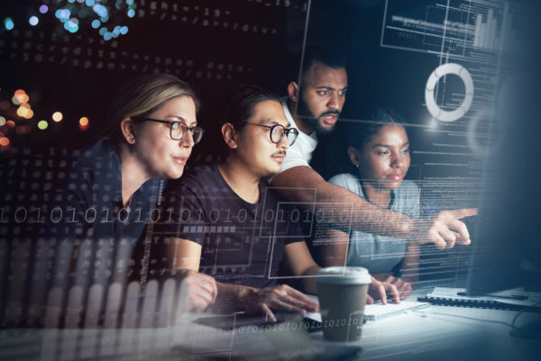 Image of IT Managed and Professional Service professionals at work on client project.