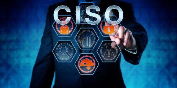 Man pointing to various technology images with CISO superimposed on top.