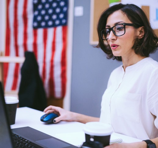 Government official at her computer.